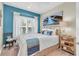 Comfortable bedroom with a nautical theme, featuring a metal frame bed and dresser at 204 Haven Beach Ct, Indian Rocks Beach, FL 33785