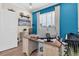 Bright office space with a large window and custom wooden desk at 204 Haven Beach Ct, Indian Rocks Beach, FL 33785