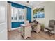 Well-lit office space with a comfortable chair and a large window view at 204 Haven Beach Ct, Indian Rocks Beach, FL 33785