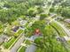 Aerial view of the property showcasing the home's location, surrounding neighborhood, and lush greenery at 215 Claire Dr, Seffner, FL 33584