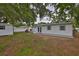Spacious backyard featuring a storage shed at 215 Claire Dr, Seffner, FL 33584