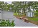Backyard featuring a barbecue area and storage shed at 215 Claire Dr, Seffner, FL 33584