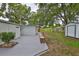 Backyard with patio, barbecue area and storage shed at 215 Claire Dr, Seffner, FL 33584