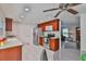 Well-lit kitchen features stainless steel appliances and open concept design at 215 Claire Dr, Seffner, FL 33584