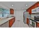Updated kitchen featuring modern appliances, ample counter space, and bright lighting at 215 Claire Dr, Seffner, FL 33584