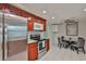 Updated kitchen featuring stainless steel appliances and adjacent dining area at 215 Claire Dr, Seffner, FL 33584