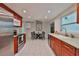 Well-lit kitchen features stainless steel appliances and a cozy breakfast nook at 215 Claire Dr, Seffner, FL 33584