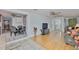Open living room featuring wood floors and ceiling fan at 215 Claire Dr, Seffner, FL 33584