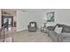 Bright living room features open floor plan and flows nicely into dining and kitchen at 215 Claire Dr, Seffner, FL 33584