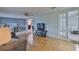 Comfortable living room with wood floors, access to the kitchen and bedroom at 215 Claire Dr, Seffner, FL 33584