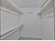 Walk-in closet with white shelving at 215 Claire Dr, Seffner, FL 33584