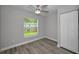Well-lit bedroom with ceiling fan, closet and a bright window at 2307 N 47Th St, Tampa, FL 33605