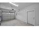 Spacious garage with automatic door opener, new door, and plenty of space at 2307 N 47Th St, Tampa, FL 33605