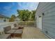 Inviting back deck area with stylish seating, perfect for outdoor relaxation and entertaining at 2412 Burlington N Ave, St Petersburg, FL 33713