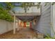 View of the covered parking area under deck in backyard at 2412 Burlington N Ave, St Petersburg, FL 33713