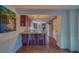Stylish kitchen featuring granite countertops, appliances and wine colored cabinetry at 2412 Burlington N Ave, St Petersburg, FL 33713