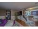 Comfortable living room with stylish decor, hardwood floors, and seamless flow to the dining area at 2412 Burlington N Ave, St Petersburg, FL 33713
