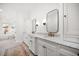 Spacious bathroom features marble counters, double vanity, and tile flooring at 307 Palmetto Ln, Largo, FL 33770