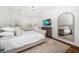 Bright bedroom features large windows, light-colored walls and decor, and stylish furnishings at 307 Palmetto Ln, Largo, FL 33770