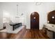 Open dining room with hardwood floors and modern decor, filled with natural light at 307 Palmetto Ln, Largo, FL 33770