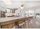 Large kitchen with counter seating and views of the dining area at 307 Palmetto Ln, Largo, FL 33770