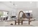 Close-up of a kitchen island sink with an open living area in the background at 307 Palmetto Ln, Largo, FL 33770