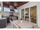 The outdoor dining area features a custom kitchen and access to the home's interior at 307 Palmetto Ln, Largo, FL 33770