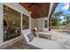 Relaxing patio with chaise lounges, offering a serene outdoor space at 307 Palmetto Ln, Largo, FL 33770