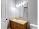 Bathroom features an updated vanity, sink, and a large mirror at 3111 W De Leon St # 2, Tampa, FL 33609