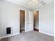 Bedroom with carpet, trim, and two closets at 3111 W De Leon St # 2, Tampa, FL 33609