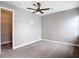 Bright bedroom featuring neutral walls and carpet, with a large closet at 3111 W De Leon St # 2, Tampa, FL 33609
