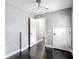 Bright bedroom featuring sleek, dark floors and a modern light fixture at 3111 W De Leon St # 2, Tampa, FL 33609