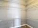 Walk-in closet with multiple levels of wire shelving at 3111 W De Leon St # 2, Tampa, FL 33609