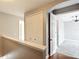 Hallway with a closet and doorway to a bedroom with ceiling fan at 3111 W De Leon St # 2, Tampa, FL 33609