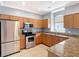 Well-equipped kitchen with stainless steel appliances and granite countertops at 3111 W De Leon St # 2, Tampa, FL 33609
