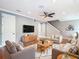 Inviting living room with hardwood floors, a cozy rug, and comfortable seating arrangement at 3111 W De Leon St # 2, Tampa, FL 33609