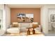 Relaxing living room featuring a comfortable sofa, stylish decor, and lots of natural light at 32066 Griffin Sands Ln, San Antonio, FL 33576
