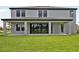 Large backyard with covered patio at 3483 Yellow Leaf Cir, Spring Hill, FL 34609