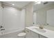 Clean, bright bathroom featuring a tub, shower, and modern vanity at 3483 Yellow Leaf Cir, Spring Hill, FL 34609