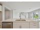 Bright, modern kitchen with a center island and open access to the living areas at 3483 Yellow Leaf Cir, Spring Hill, FL 34609