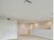Bright loft area with neutral walls, carpeting, and a closet at 3483 Yellow Leaf Cir, Spring Hill, FL 34609