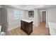 Laundry Closet with a window nearby the butcher block island in the kitchen at 3504 Wedge Way, New Port Richey, FL 34655