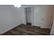 Bedroom features hardwood floors and a closet at 3513 Danny Bryan Blvd, Tampa, FL 33619