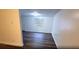 Inviting living room with hard wood floors, fresh paint, a window, and plenty of space at 3513 Danny Bryan Blvd, Tampa, FL 33619