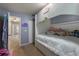 bedroom includes a bunk bed with storage and access to the hallway at 3521 Kings Rd # 105, Palm Harbor, FL 34685