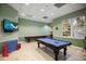 Spacious game room with a variety of entertainment options for all ages at 3521 Kings Rd # 105, Palm Harbor, FL 34685