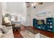 Comfortable living room featuring wood floors, neutral decor, and lots of natural light at 3521 Kings Road #105 at 3521 Kings Rd # 105, Palm Harbor, FL 34685