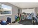 Spacious basement area, perfect for storage or a recreational space, with ample shelving and natural light at 3615 Greatwood Ct, Land O Lakes, FL 34639