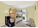 Bedroom with bunk beds, carpeted floors, natural light from window and closet at 3615 Greatwood Ct, Land O Lakes, FL 34639