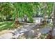 Charming one-story home with lush landscaping, inviting curb appeal, and private driveway in a lush neighborhood at 3615 Greatwood Ct, Land O Lakes, FL 34639